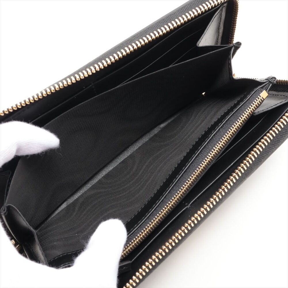 Gucci GG Matelasse Leather Round Zip Wallet Black - Picture 5 of 8